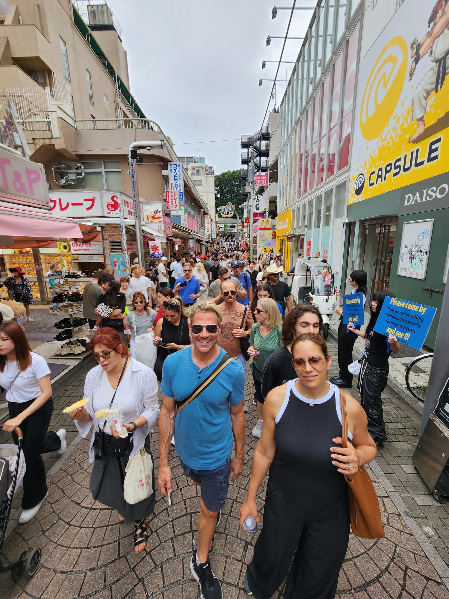Tour group in front of traditional gate